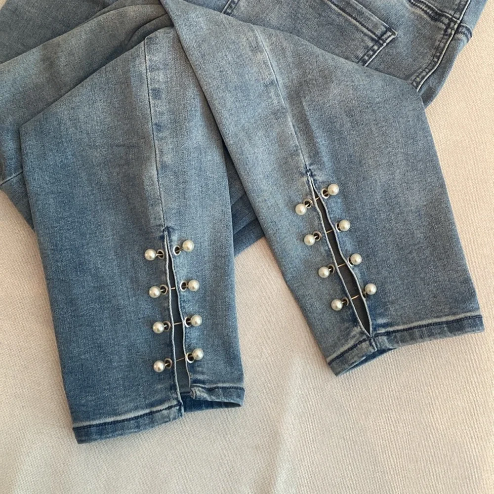 bebe • High Waist Skinny Pearl Detail Ankle Jean - Medium Blue Wash - Picture 6 of 13